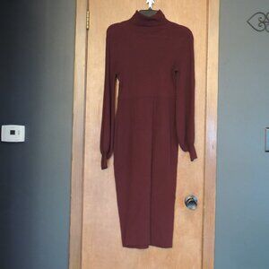 Stunning Gabrielle Union ribbed bodycon sweater dress in a bold red color. Featu